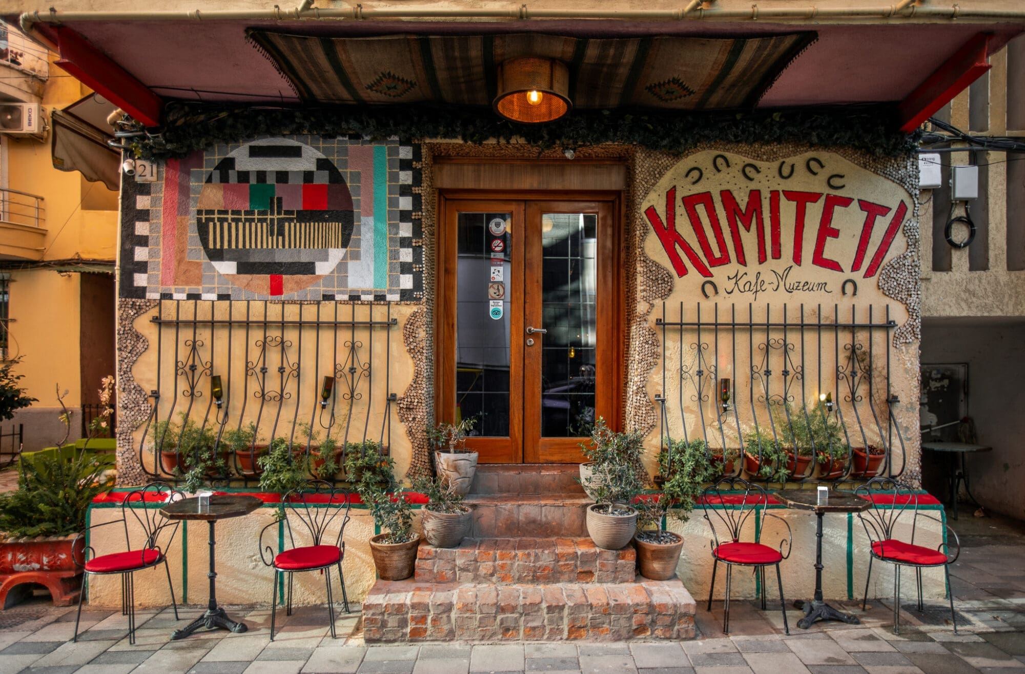 The exterior of quirky bar and cafe Komiteti in Tirana, Albania