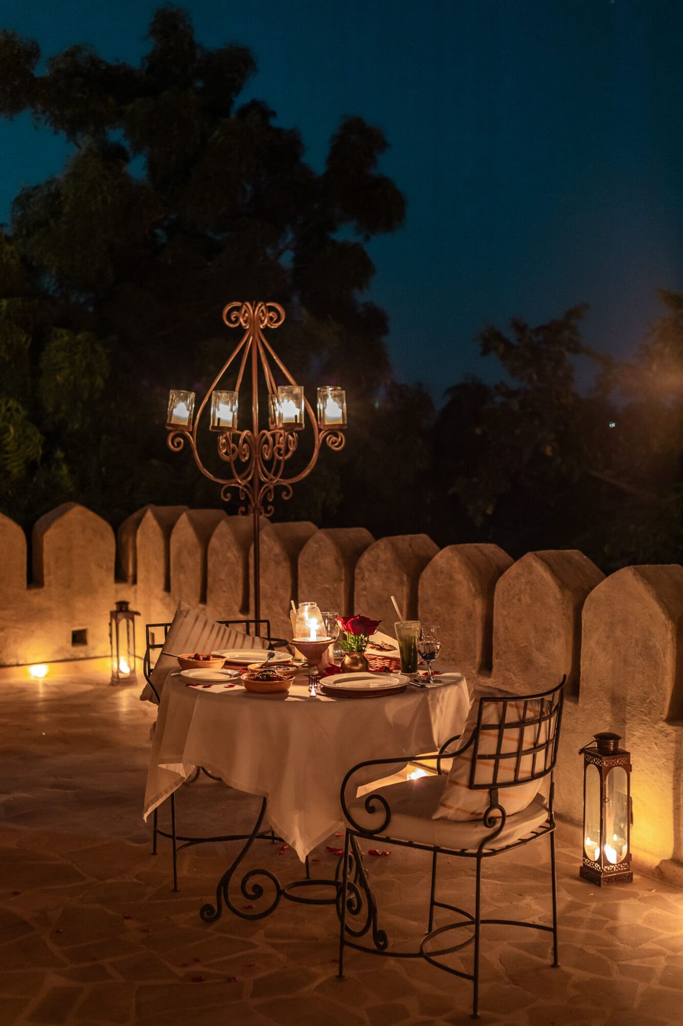 After dark evening private dining by candelight at Mihir Garh Hotel