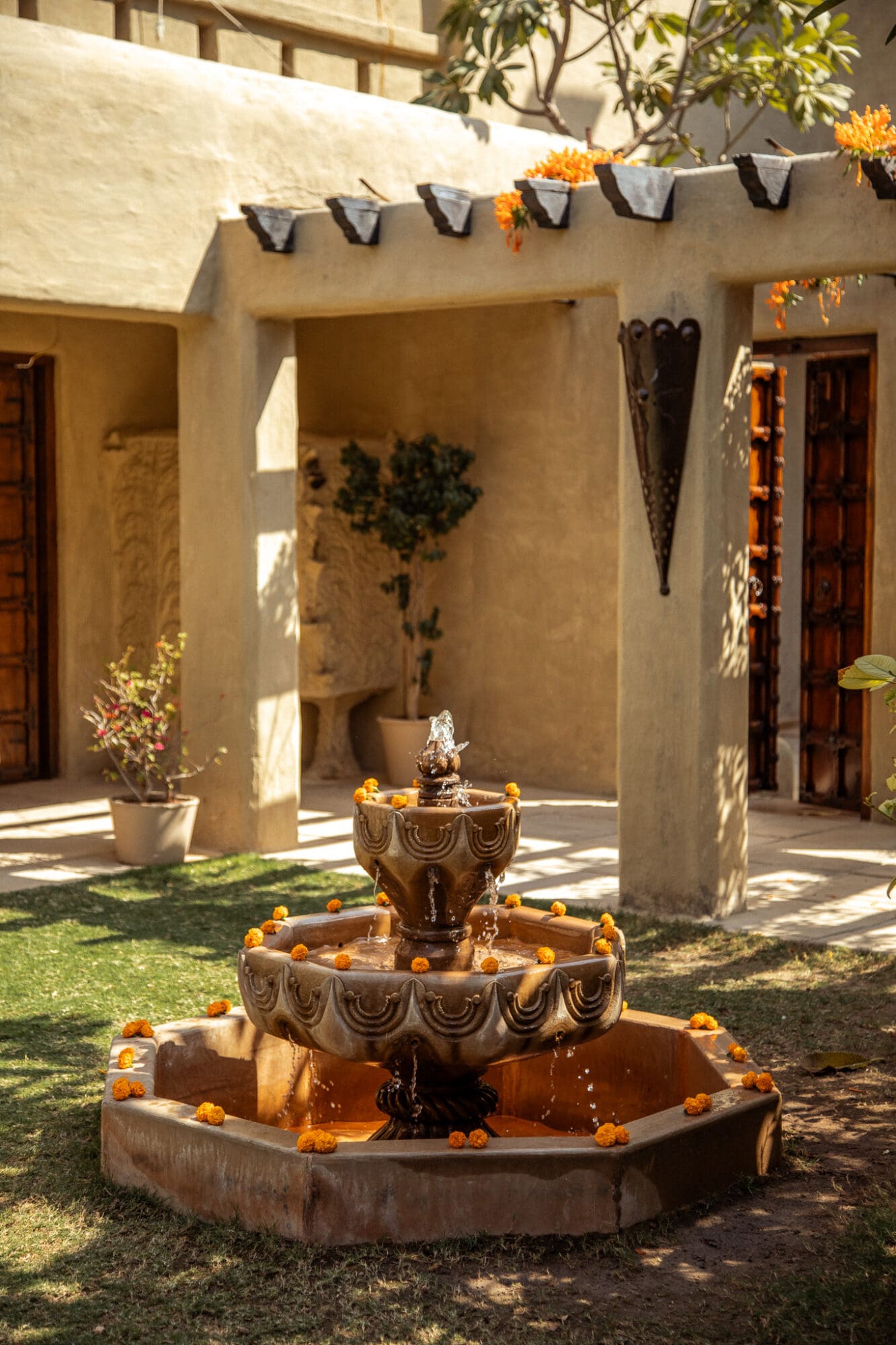 Fountain in a courtyard at Mihir Garh Hotel