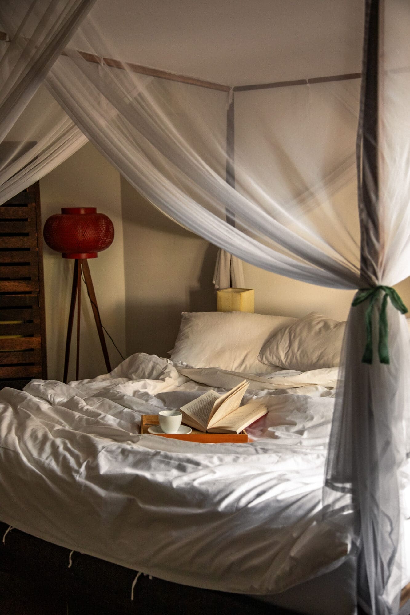 Bedroom Bed with Coffee and Book Pavilion Hotel Phnom Penh